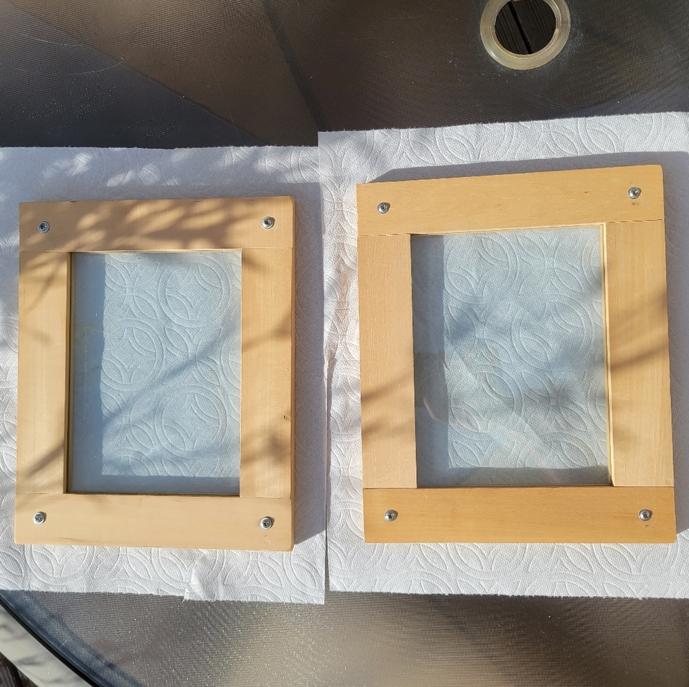 Set of 2 natural wooden picture frames, measure approx 10.5"l x 9.75"w